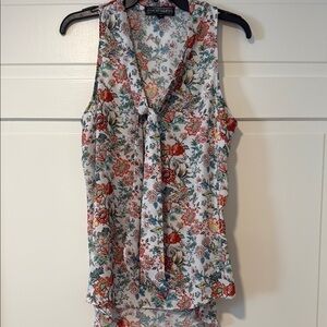Almost Famous Floral Sleeveless Tie Front Blouse medium
